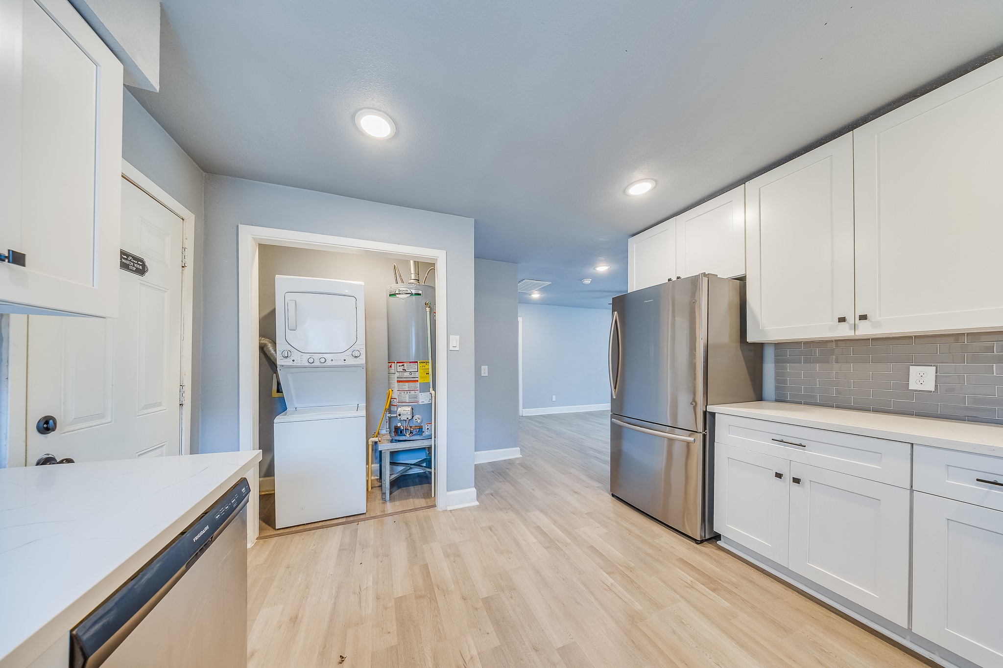 4523 Keystone Street Houston, TX 77021 - Photo 14 of 24 a kitchen with stainless steel appliances a refrigerator and a sink