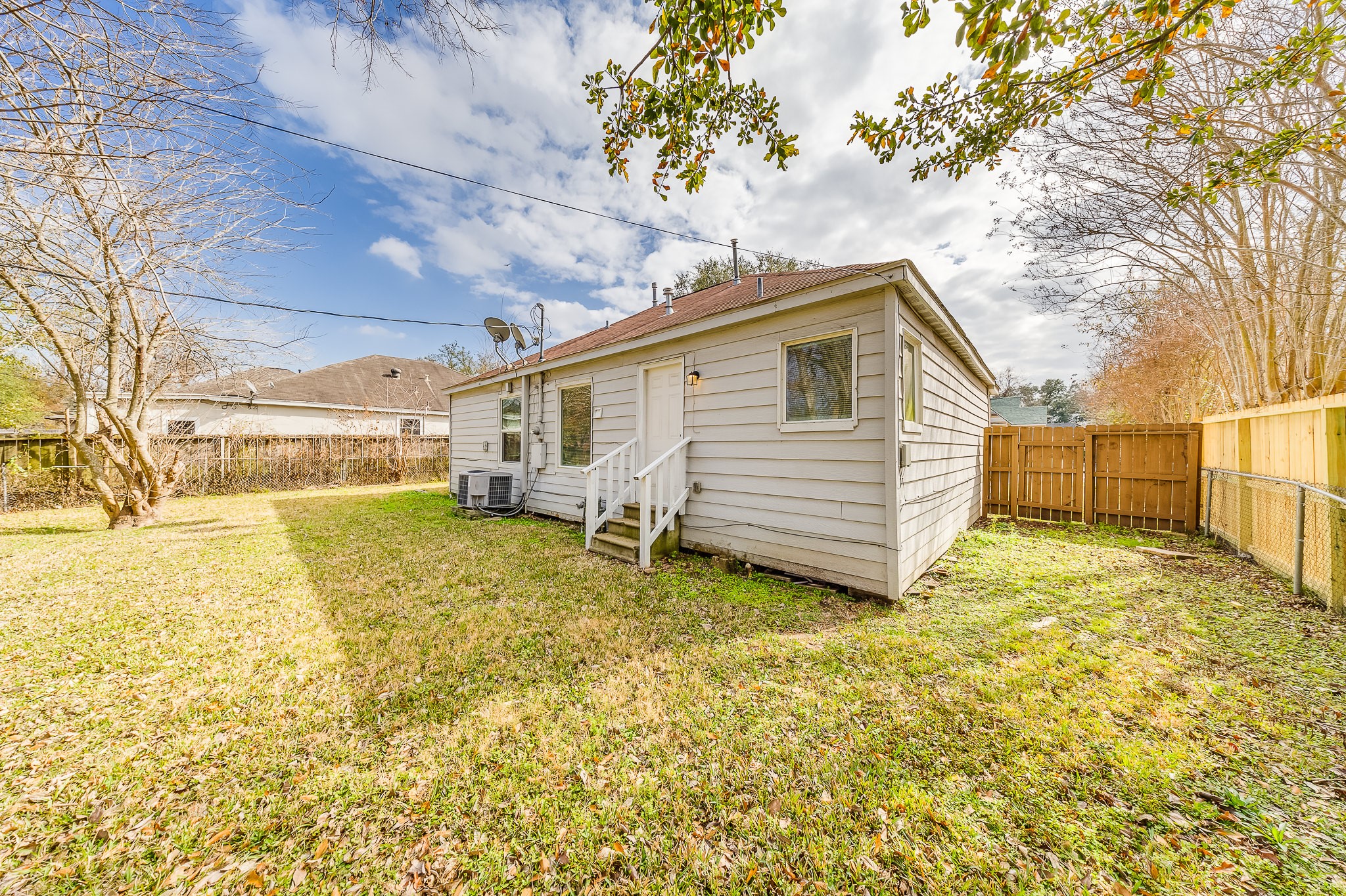 4523 Keystone Street Houston, TX 77021 - Photo 22 of 24 a view of a house with a yard