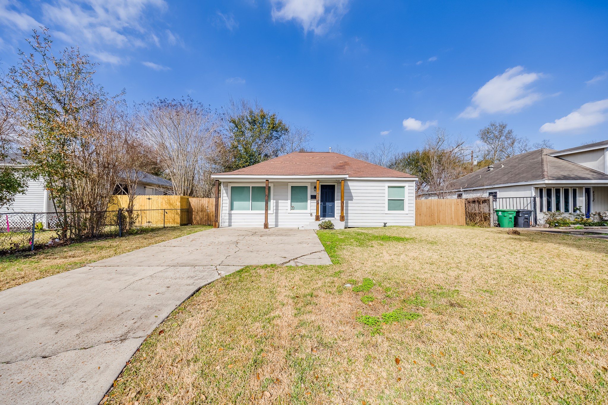 4523 Keystone Street Houston, TX 77021 - Photo 6 of 24 a front view of a house with a yard