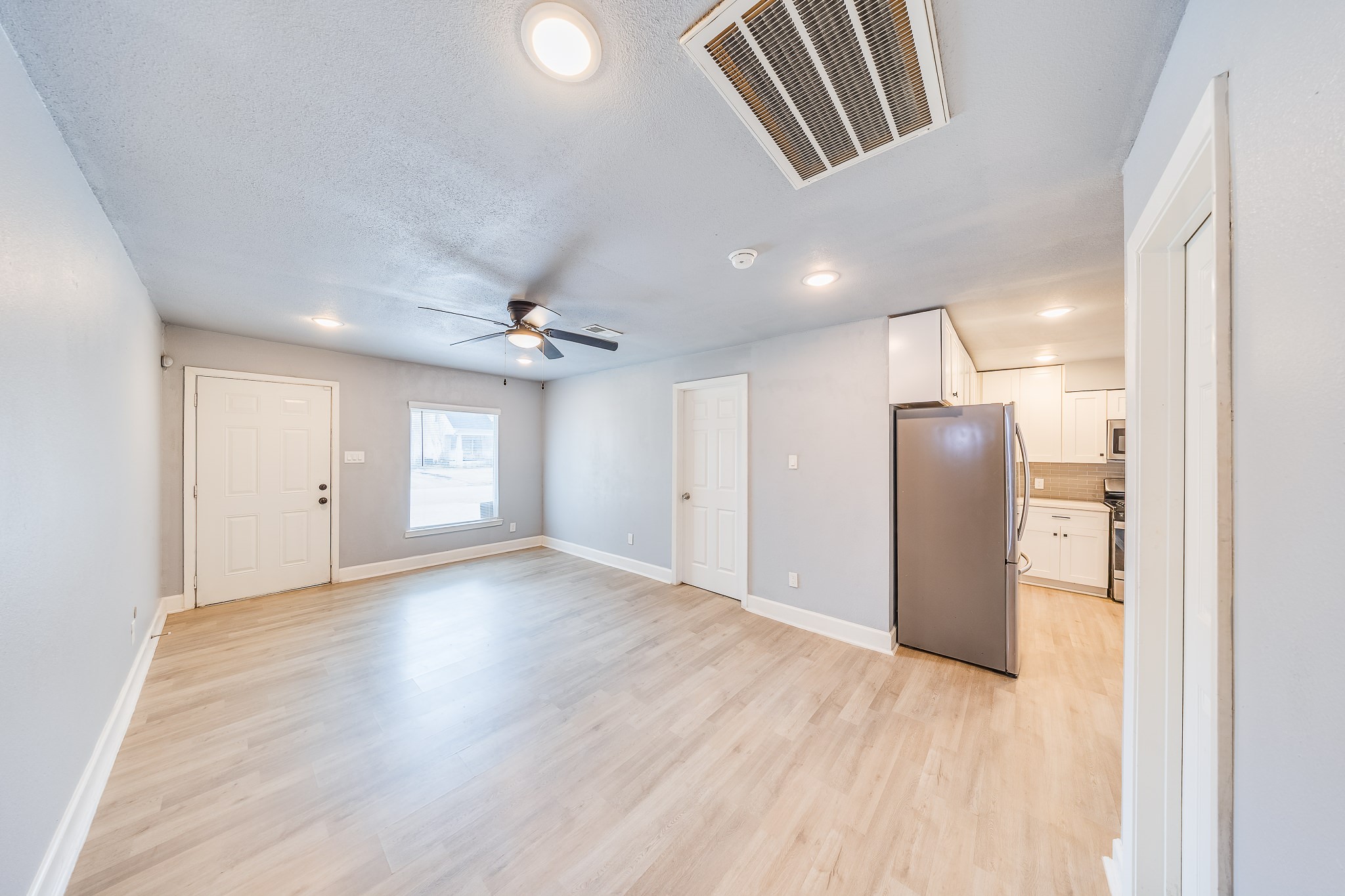 4523 Keystone Street Houston, TX 77021 - Photo 10 of 24 a view of an empty room with a window