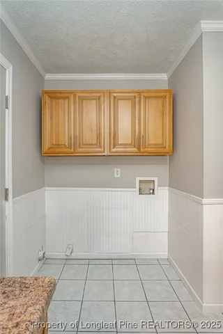 a view of a livingroom with wooden floor and a window