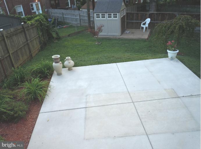 5842 Monticello Road Alexandria, VA 22303 - Photo 23 of 26 a view of a back yard of the house
