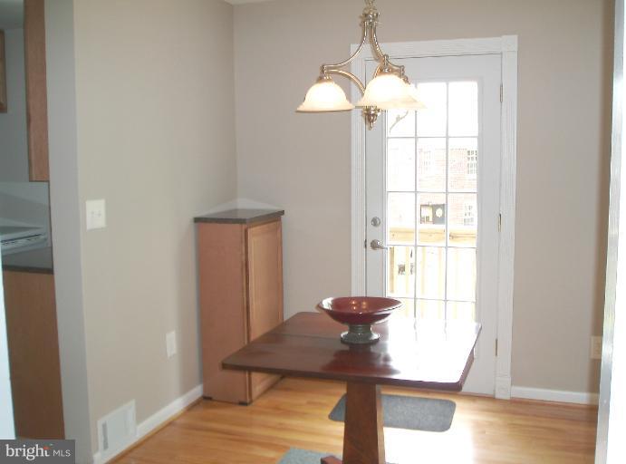 5842 Monticello Road Alexandria, VA 22303 - Photo 4 of 26 a view of entryway with wooden floor