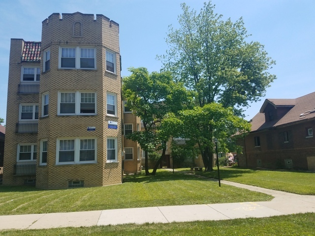 10981 South Church Street, Unit 3B Chicago, IL 60643 - Photo 1 of 8 a view of a building with a yard