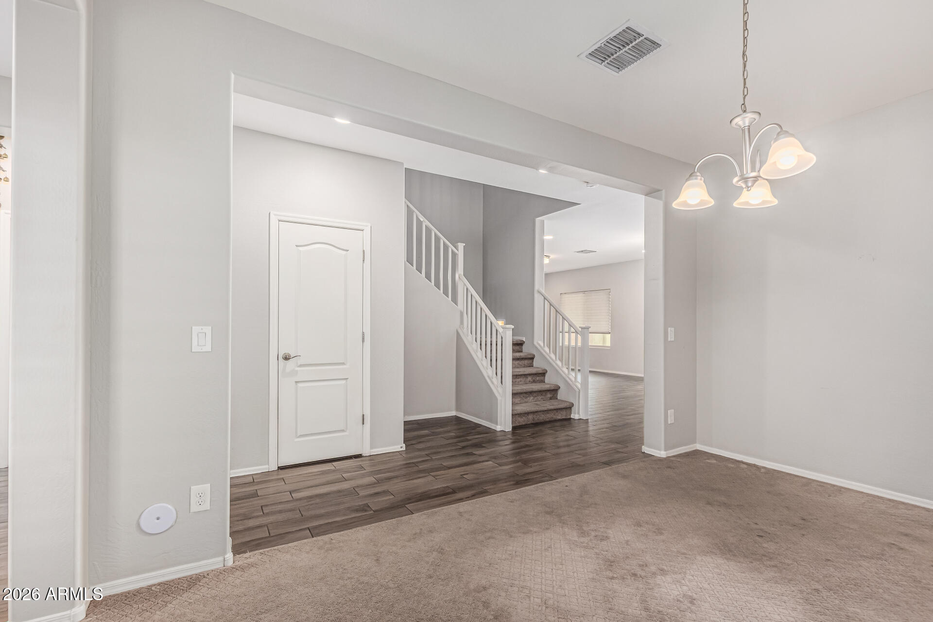 2381 East Brigadier Drive Gilbert, AZ 85298 - Photo 11 of 36 a view of a hallway with staircase