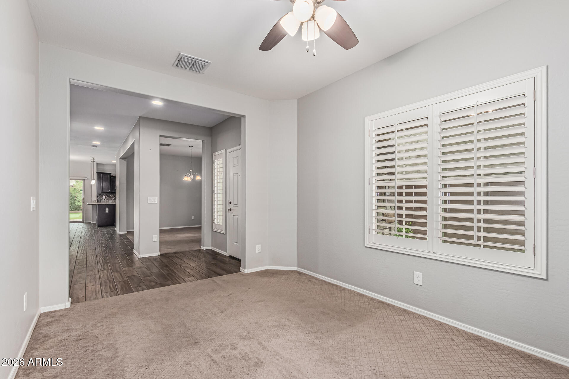 2381 East Brigadier Drive Gilbert, AZ 85298 - Photo 14 of 36 a view of livingroom with hardwood floor and hallway