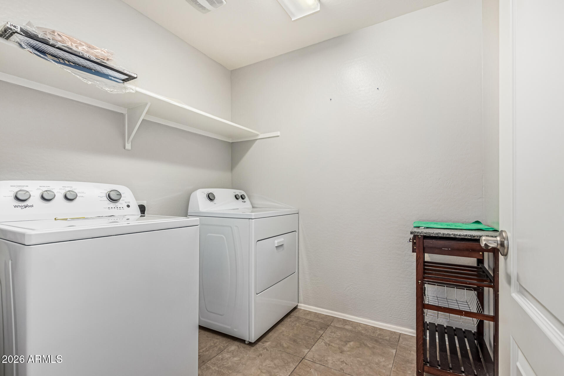 2381 East Brigadier Drive Gilbert, AZ 85298 - Photo 30 of 36 a utility room with dryer and washer