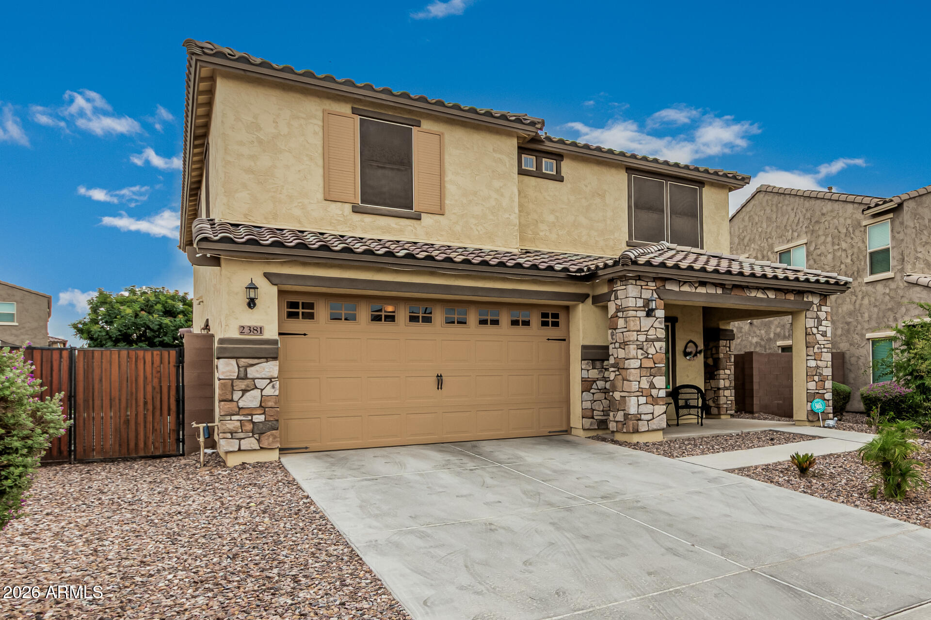 2381 East Brigadier Drive Gilbert, AZ 85298 - Photo 3 of 36 front view of a house with a outdoor space