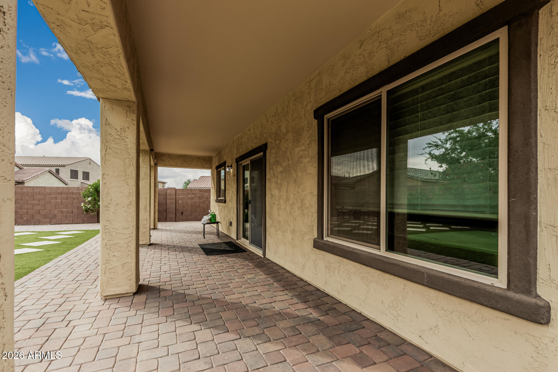 2381 East Brigadier Drive Gilbert, AZ 85298 - Photo 31 of 36 a view of a porch with chairs