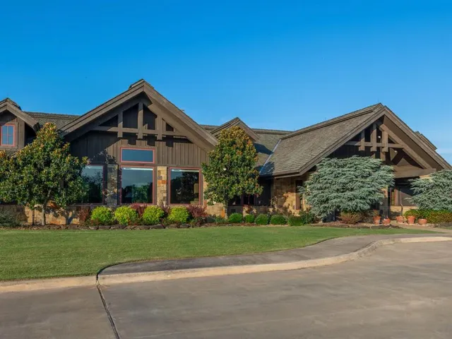 a view of a lake with a yard