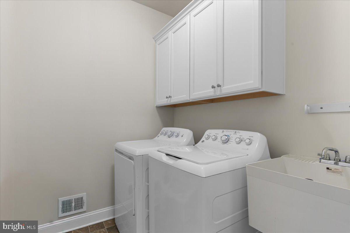 13904 Ensign Road Solomons, MD 20688 - Photo 22 of 42 laundry room main level