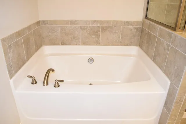 a bathroom with a bathtub