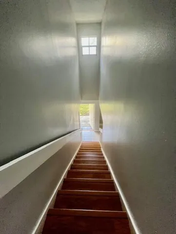 a view of entryway with wooden floor