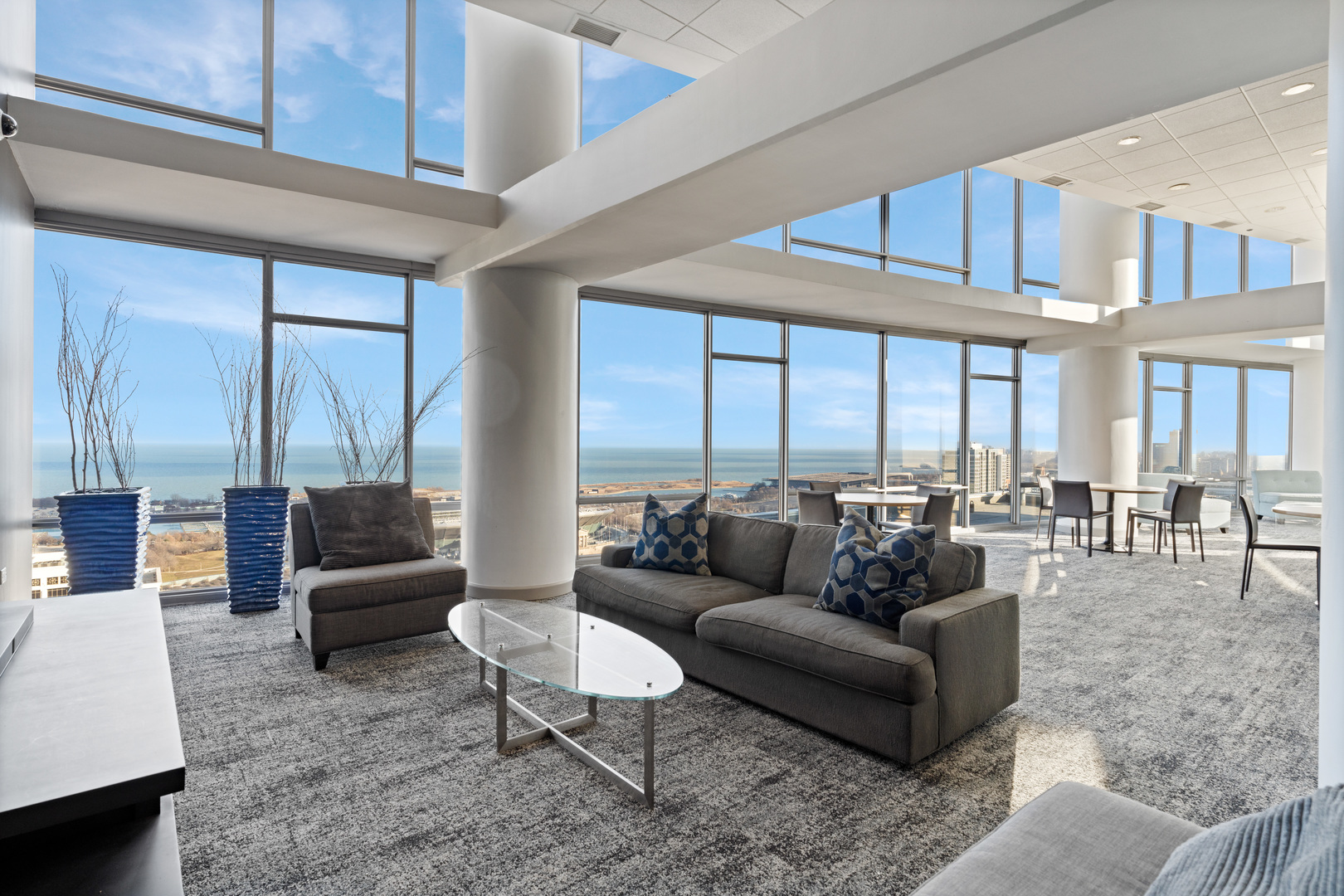 100 East 14th Street, Unit 1203 Chicago, IL 60605 - Photo 24 of 28 a living room with furniture and a large window