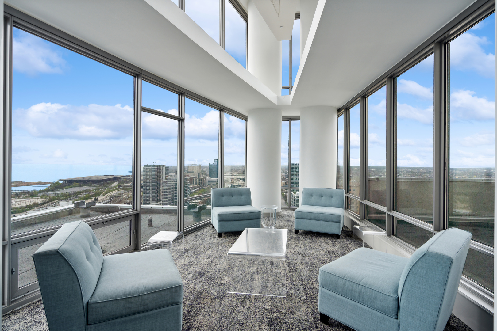 100 East 14th Street, Unit 1203 Chicago, IL 60605 - Photo 26 of 28 a living room with furniture and floor to ceiling windows