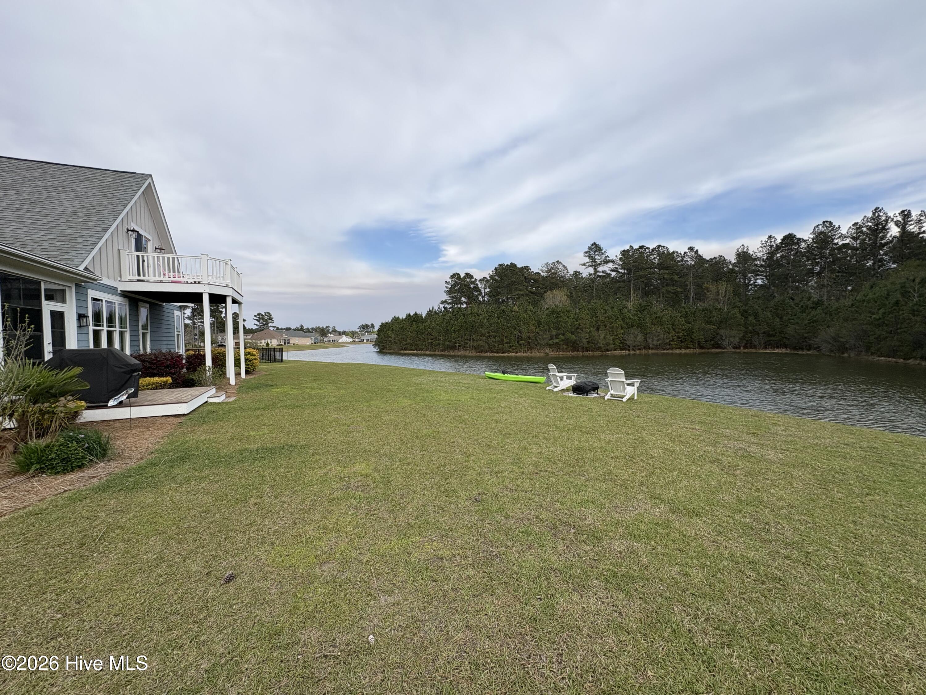 3012 Watercrest Loop New Bern, NC 28562 - Photo 12 of 84 fire pit/ lake
