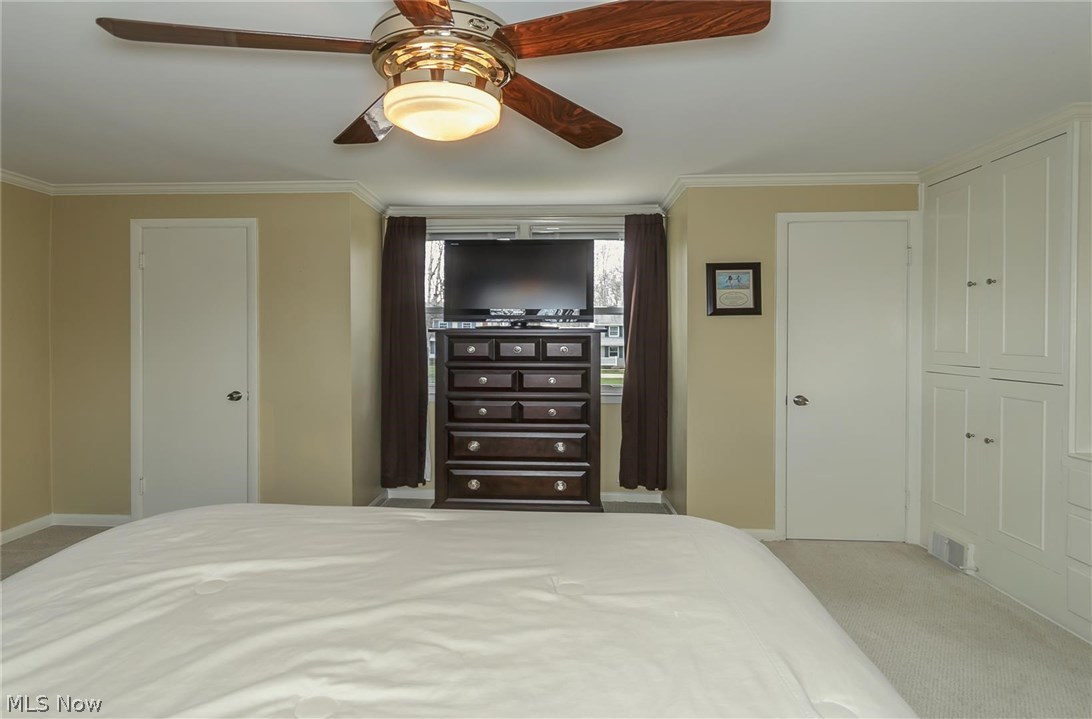 1143 Brainard Road Lyndhurst, OH 44124 - Photo 16 of 35 Master bedroom with 2 closets and built in shelves
