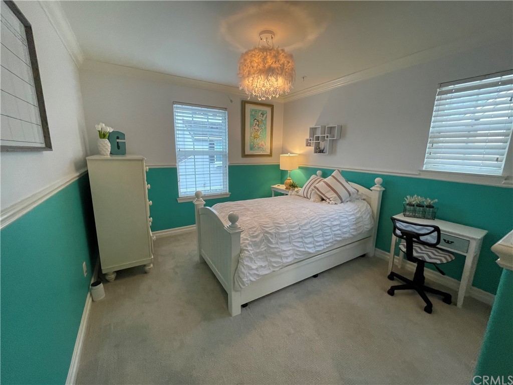 21 Kelfield Drive Ladera Ranch, CA 92694 - Photo 17 of 18 a bedroom with a bed and a chair