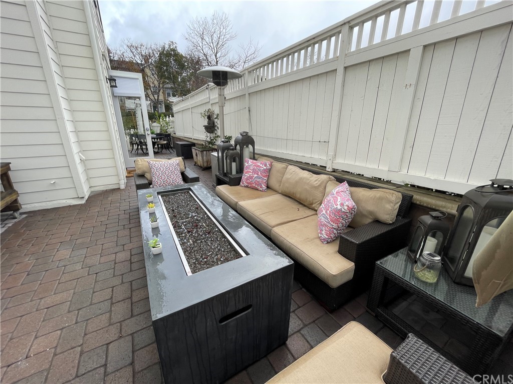 21 Kelfield Drive Ladera Ranch, CA 92694 - Photo 18 of 18 a view of a patio with couches chairs and a rug
