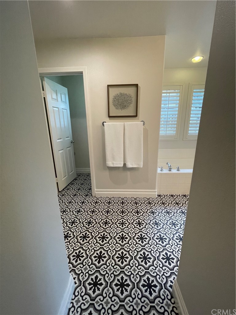 21 Kelfield Drive Ladera Ranch, CA 92694 - Photo 8 of 18 a bathroom with a granite countertop sink and a mirror