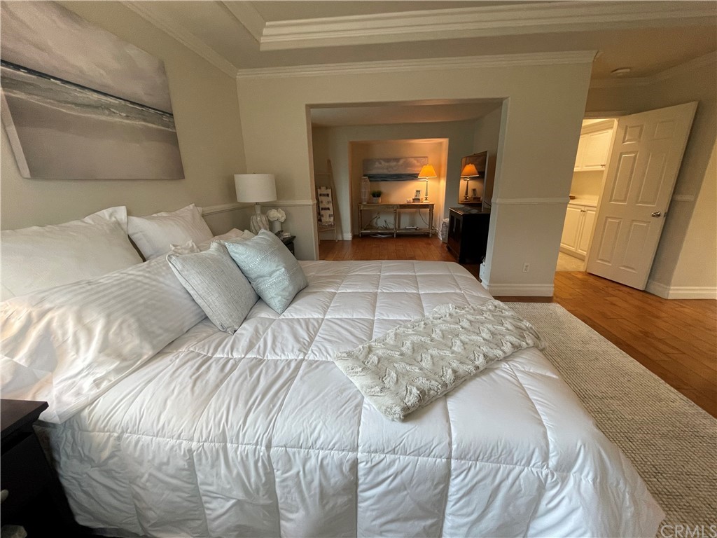 21 Kelfield Drive Ladera Ranch, CA 92694 - Photo 10 of 18 a bedroom with a bed and a mirror