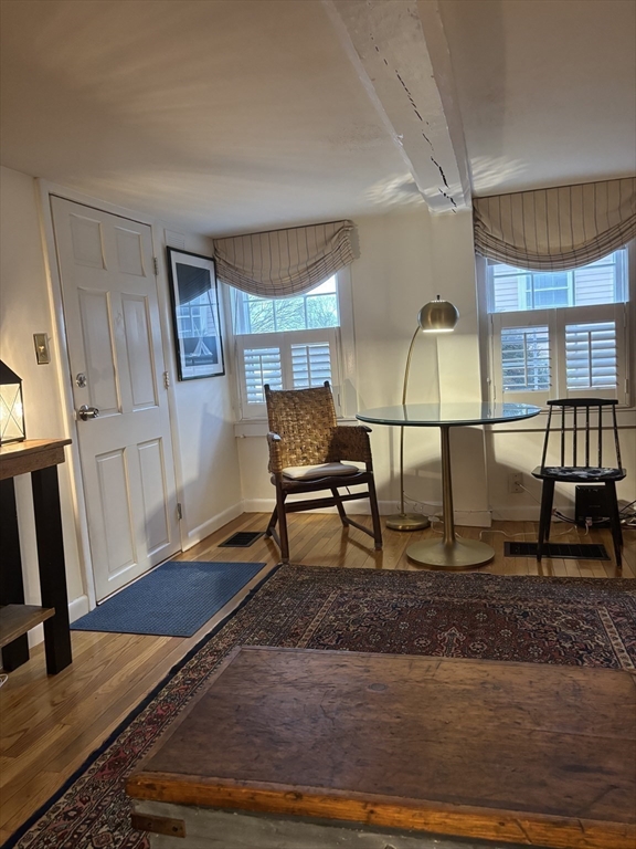 7 Lee Street, Unit 1 Marblehead, MA 01945 - Photo 11 of 32 a view of a livingroom with furniture and staircase