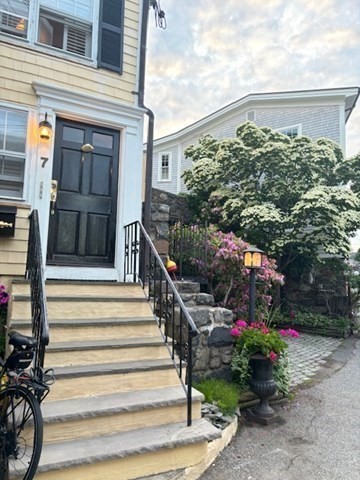 7 Lee Street, Unit 1 Marblehead, MA 01945 - Photo 23 of 32 a view of a house with a garden