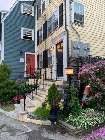 7 Lee Street, Unit 1 Marblehead, MA 01945 - Photo 24 of 32 a view of a building with potted plants