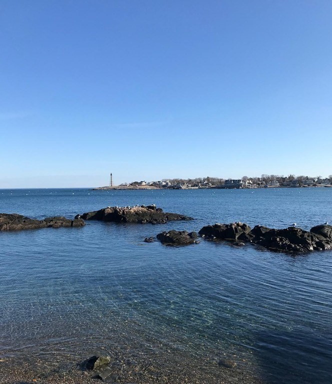 7 Lee Street, Unit 1 Marblehead, MA 01945 - Photo 30 of 32 a view of a lake with houses in background