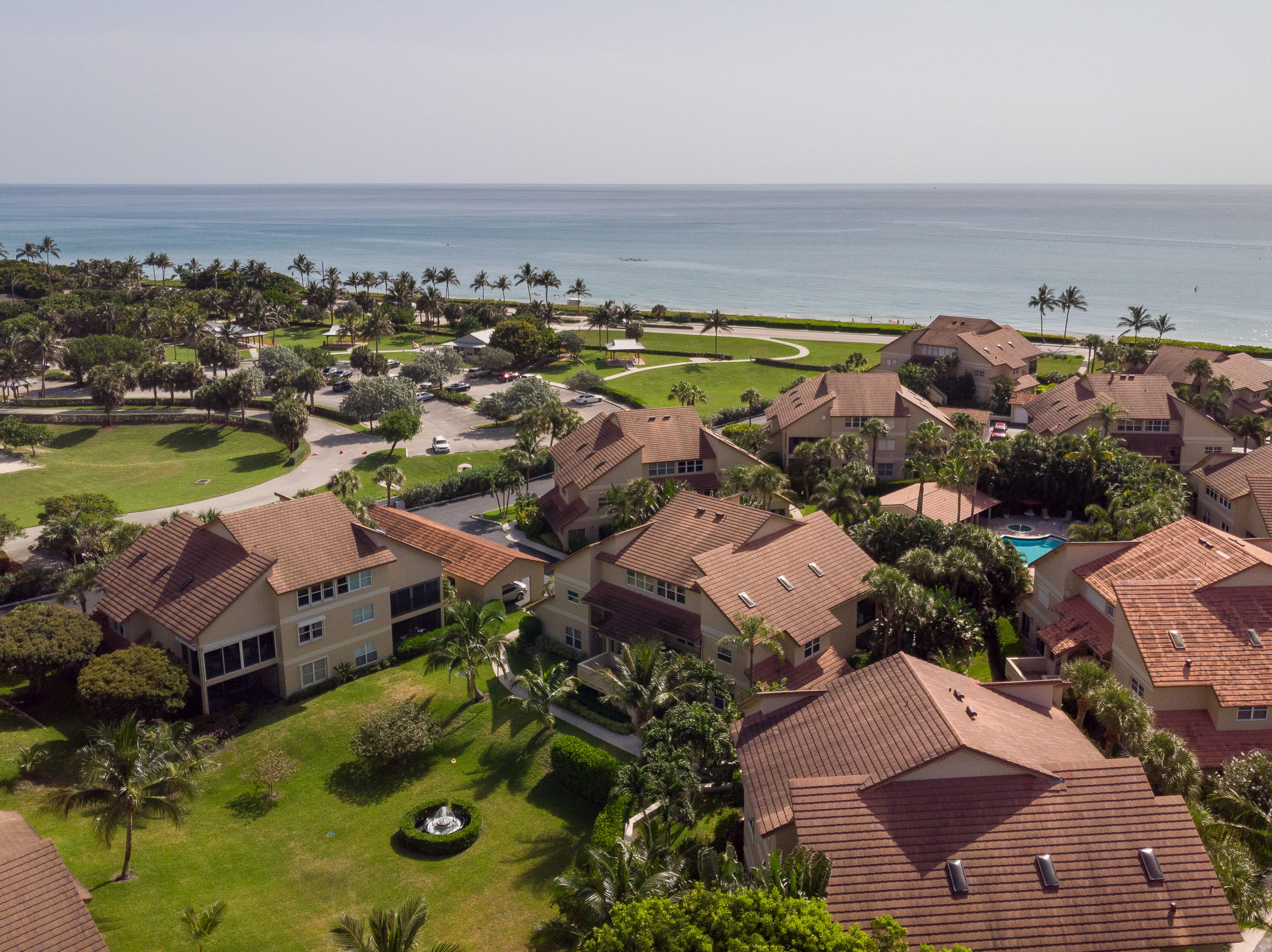 4161 U.S. Highway 1, Unit E2 Jupiter, FL 33477 - Photo 29 of 37 an aerial view of residential houses with outdoor space