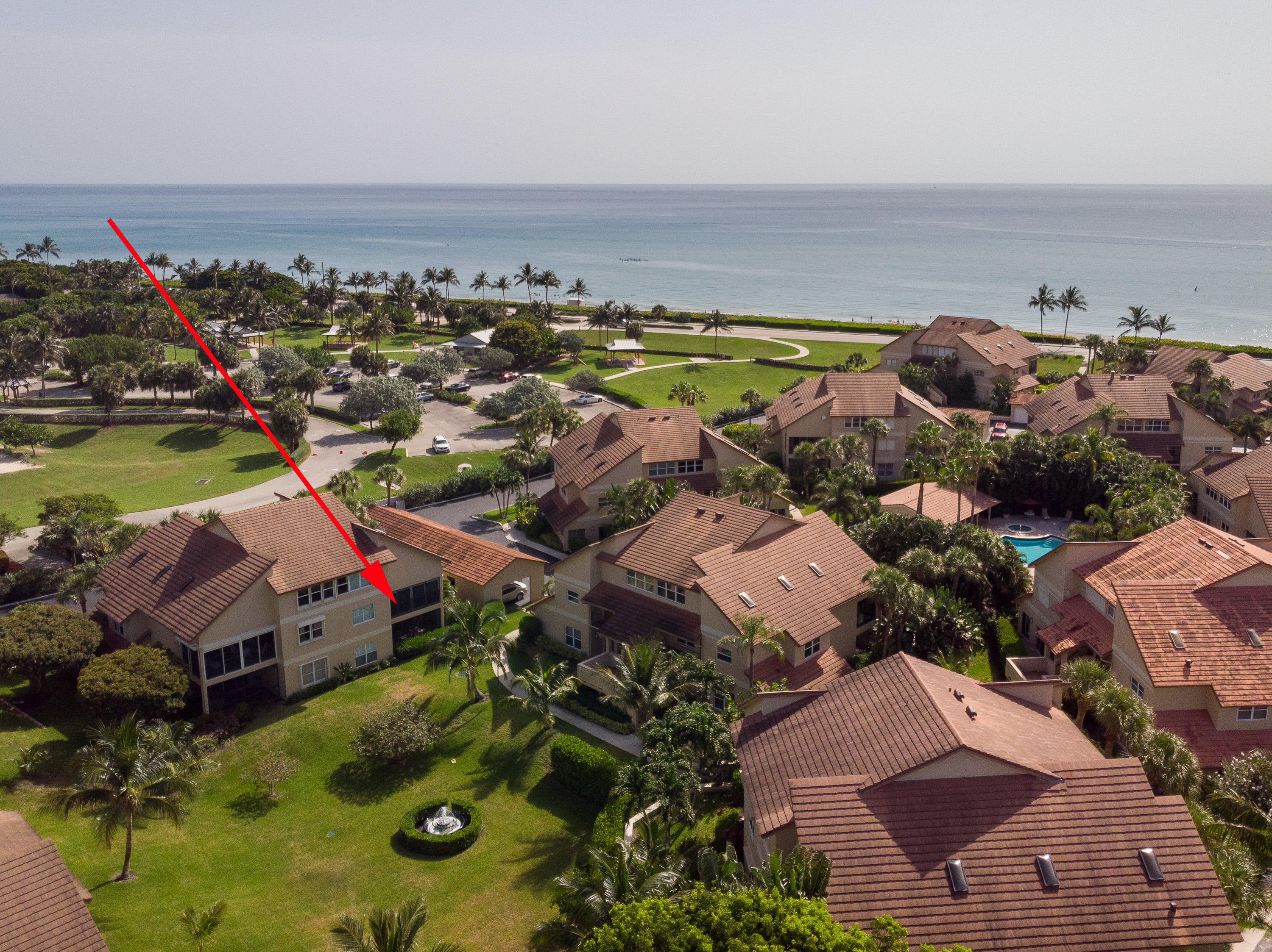 4161 U.S. Highway 1, Unit E2 Jupiter, FL 33477 - Photo 30 of 37 an aerial view of residential houses with outdoor space