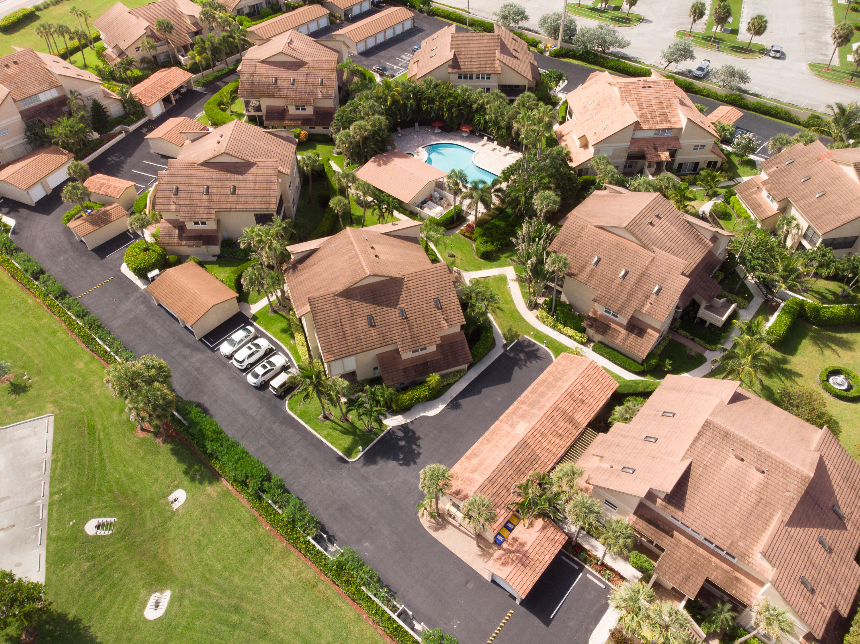4161 U.S. Highway 1, Unit E2 Jupiter, FL 33477 - Photo 32 of 37 an aerial view of residential houses with outdoor space