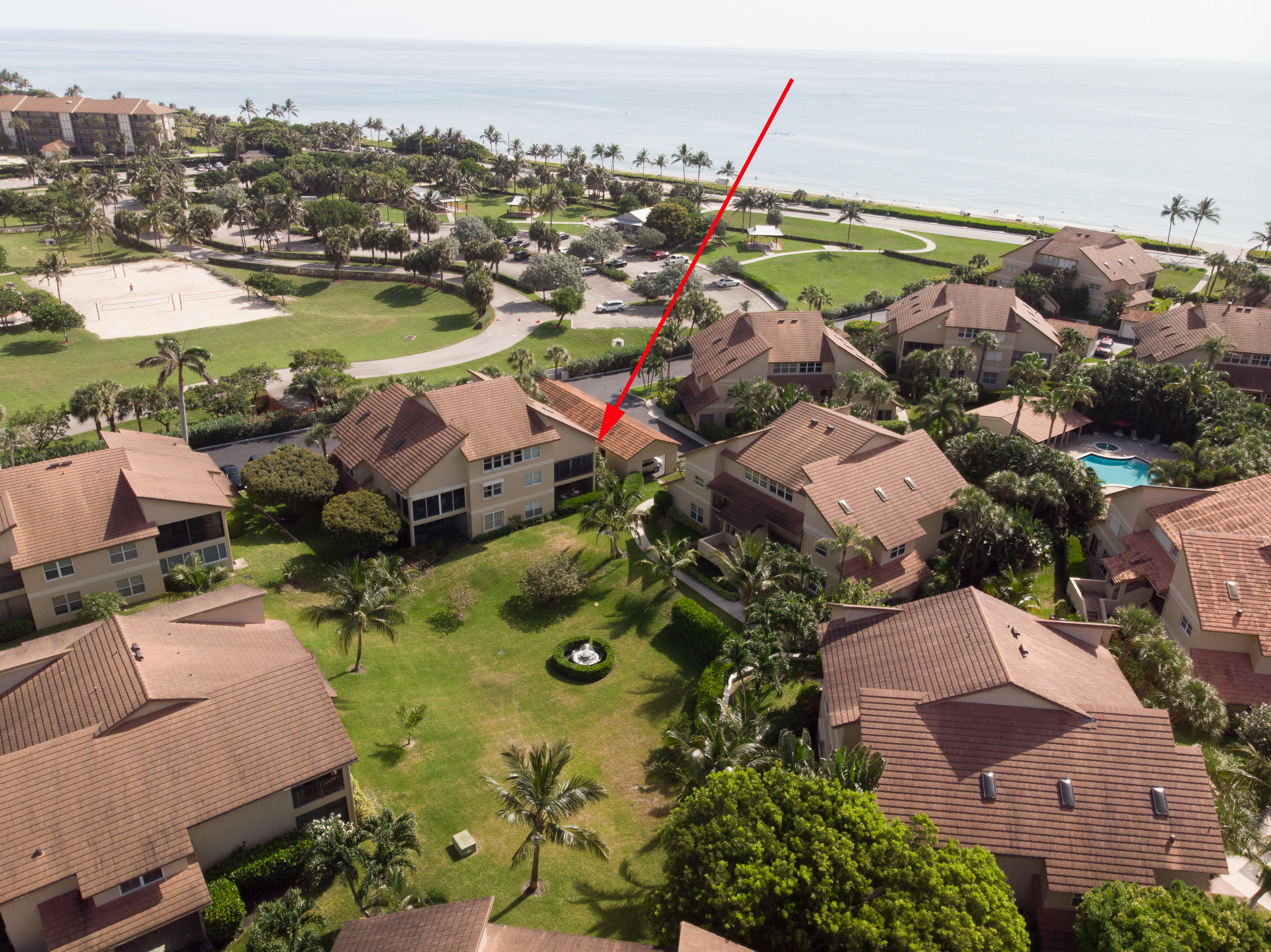 4161 U.S. Highway 1, Unit E2 Jupiter, FL 33477 - Photo 34 of 37 an aerial view of a residential houses with outdoor space and swimming pool