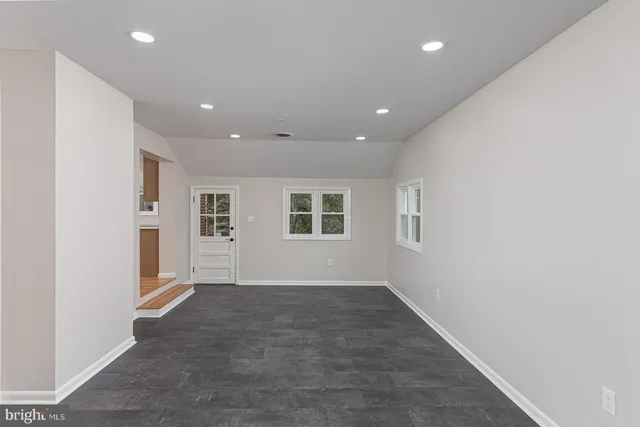 an empty room with windows