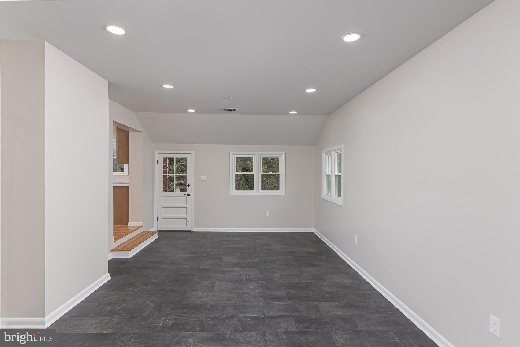 9508 Buckhorn Road Baltimore, MD 21234 - Photo 12 of 40 Spacious, light-filled living area awaits you.