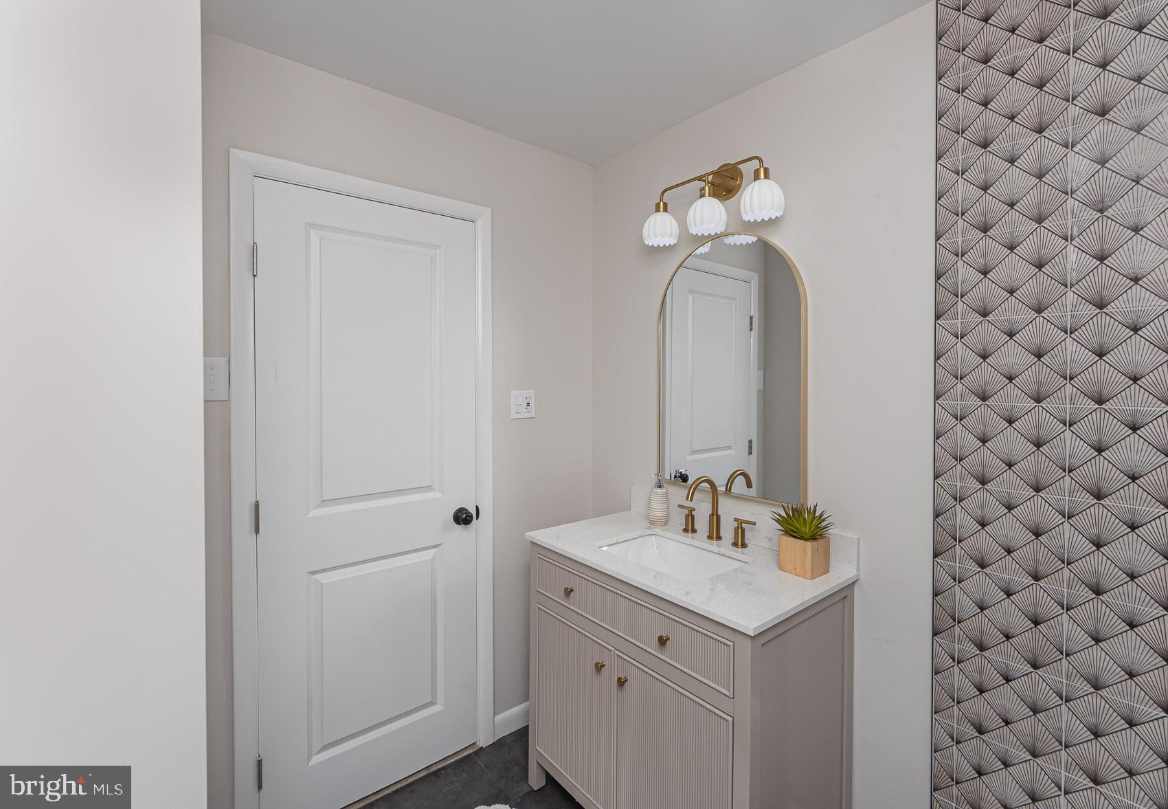 9508 Buckhorn Road Baltimore, MD 21234 - Photo 18 of 40 Elegant bathroom with modern fixtures.