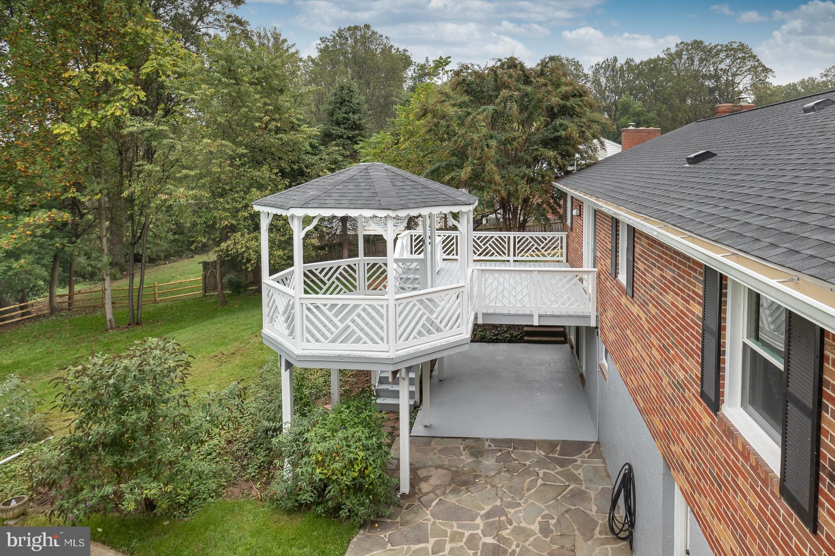 9508 Buckhorn Road Baltimore, MD 21234 - Photo 34 of 40 Charming gazebo overlooking lush greenery.