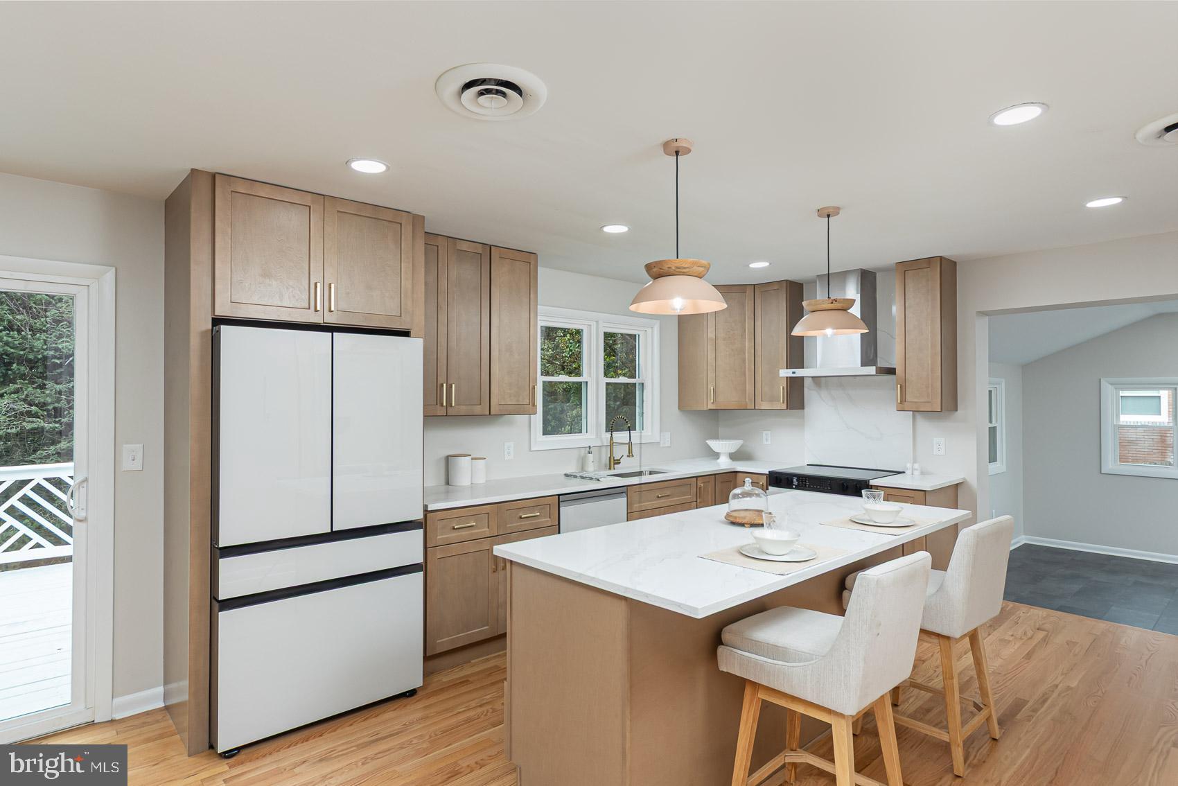 9508 Buckhorn Road Baltimore, MD 21234 - Photo 9 of 40 Modern kitchen with warm wood accents.
