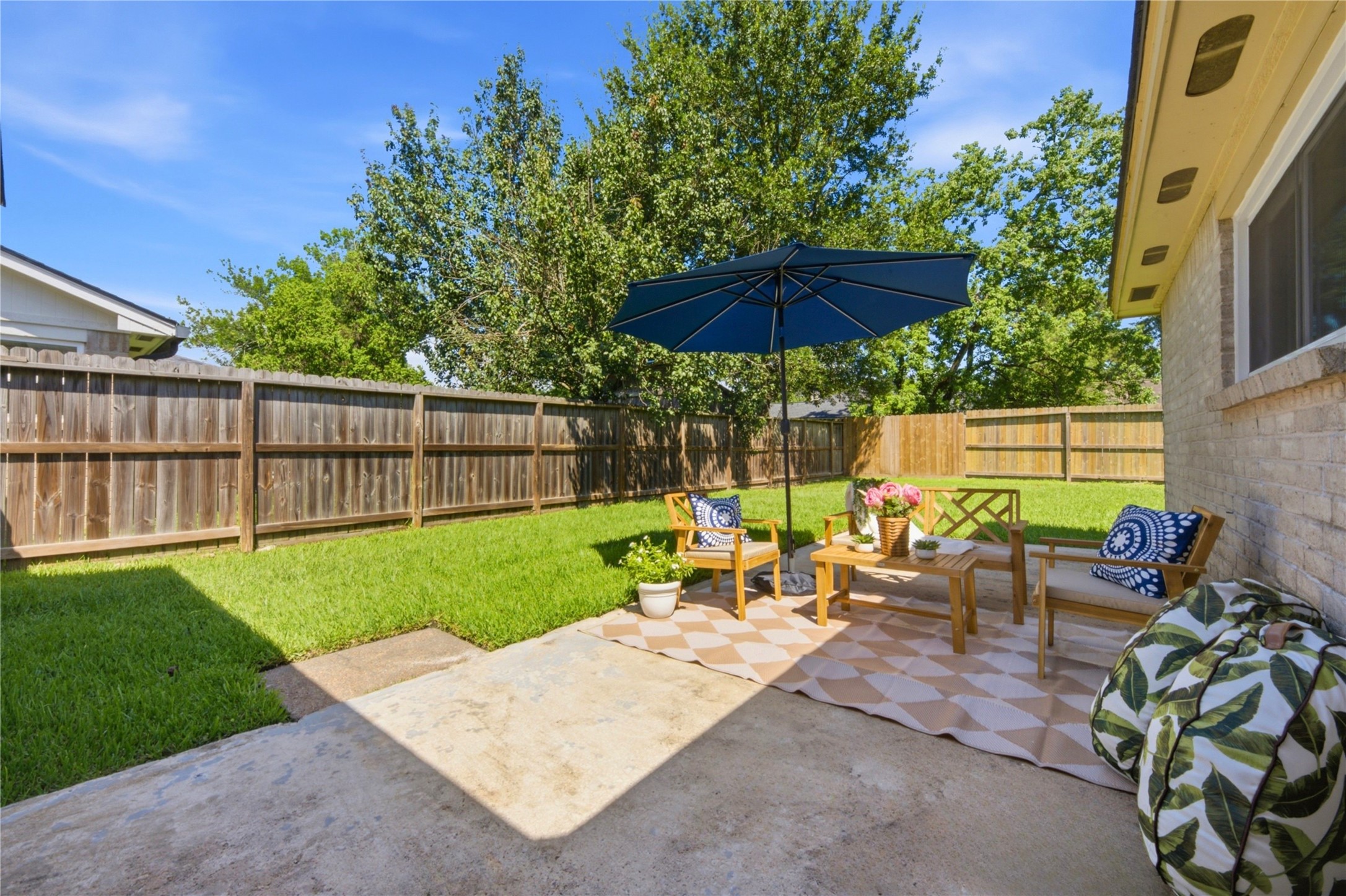 4019 Postwood Drive Spring, TX 77388 - Photo 33 of 50 a view of a backyard with sitting area and furniture