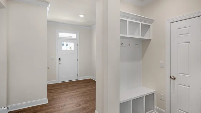 a view of bathroom with wooden floor