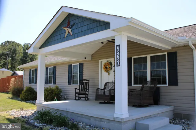 a view of house with patio