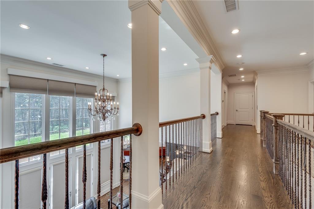 187 Fontaine Road Southwest Mableton, GA 30126 - Photo 43 of 84 a view of a hallway with wooden floor and staircase