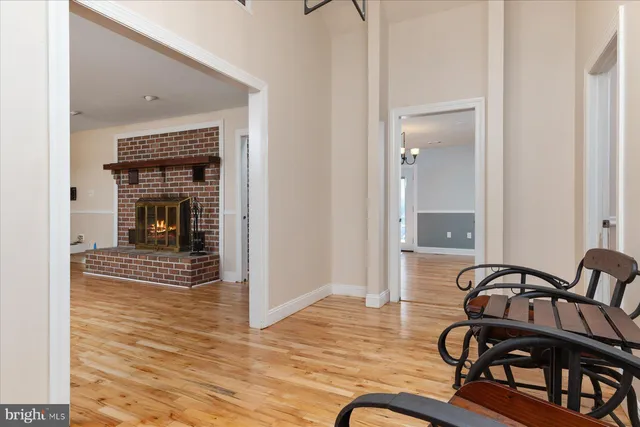 a view of balcony with two chairs and a stove