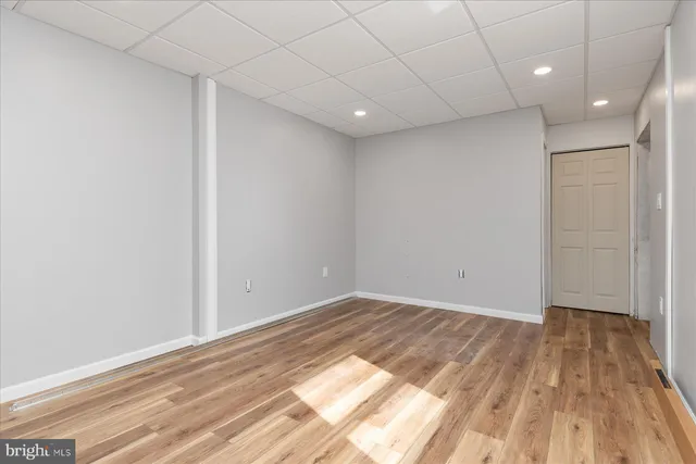 a front view of a house with a yard table and chairs