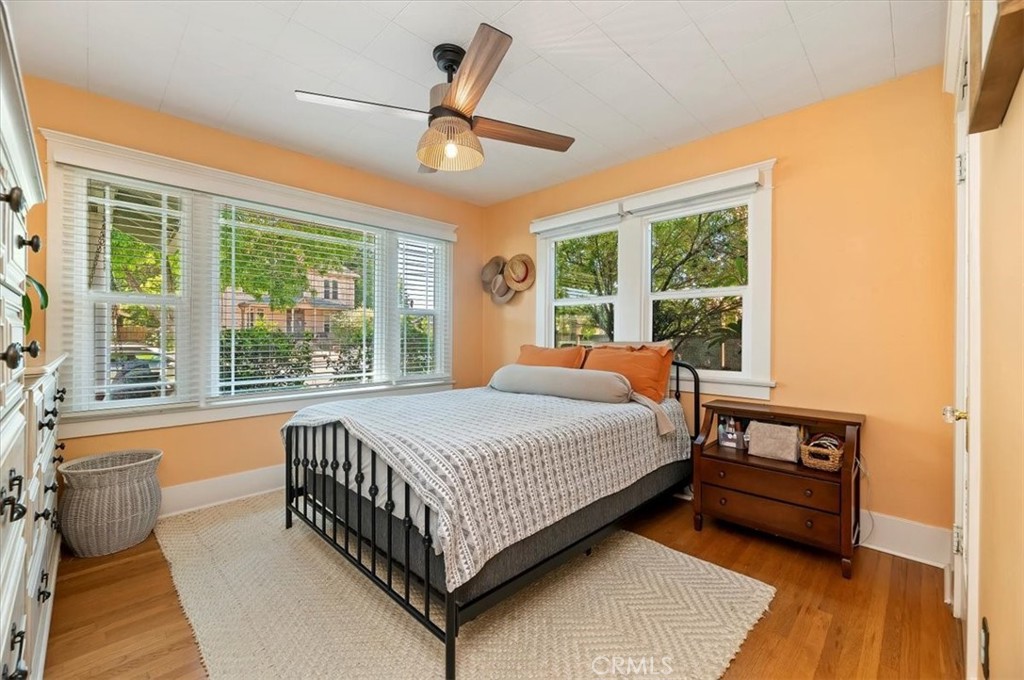 3398 Locust Street Riverside, CA 92501 - Photo 19 of 33 a bed sitting in a spacious bedroom next to a window
