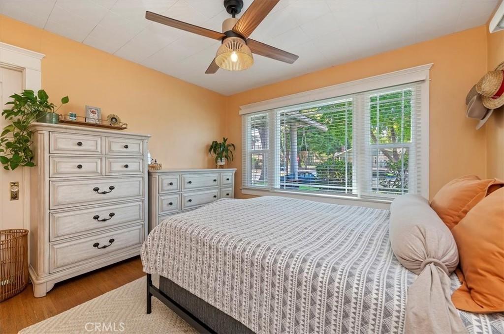 3398 Locust Street Riverside, CA 92501 - Photo 20 of 33 a bedroom with a large bed and a window