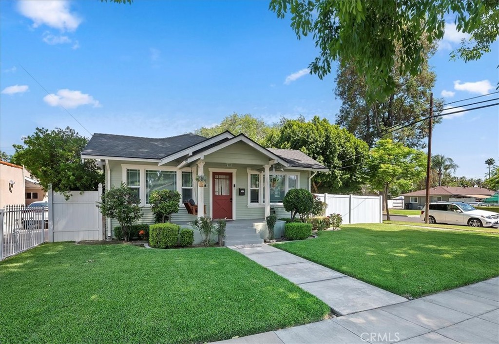 3398 Locust Street Riverside, CA 92501 - Photo 3 of 33 a front view of a house with a yard