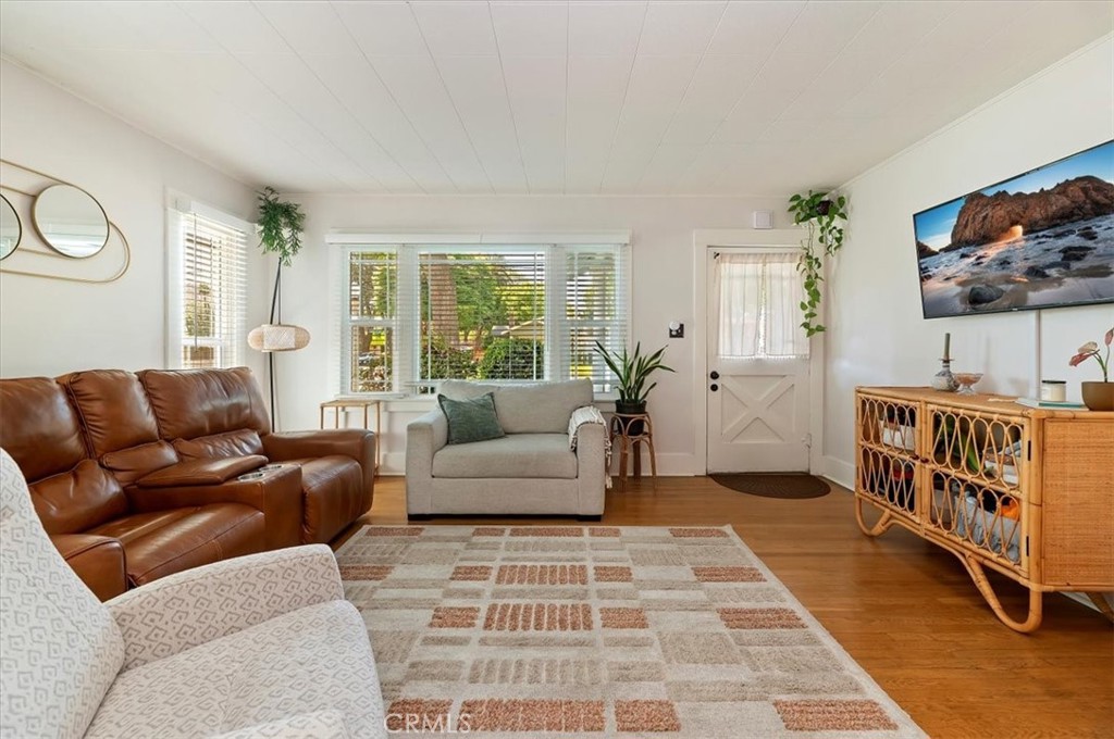 3398 Locust Street Riverside, CA 92501 - Photo 10 of 33 a living room with furniture and a rug