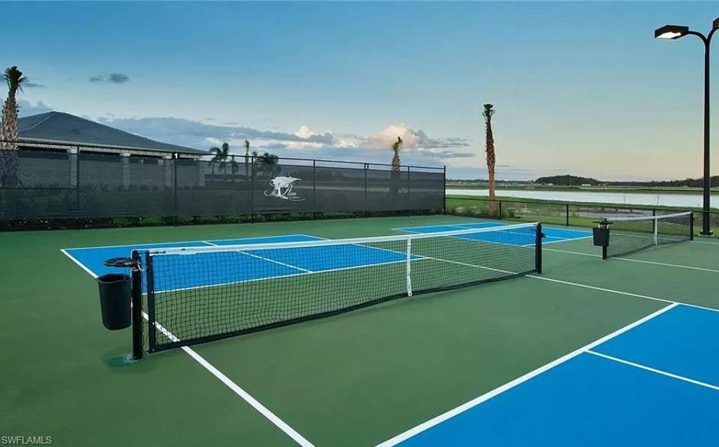 19477 The Pl Boulevard Estero, FL 33928 - Photo 32 of 36 a view of a tennis court