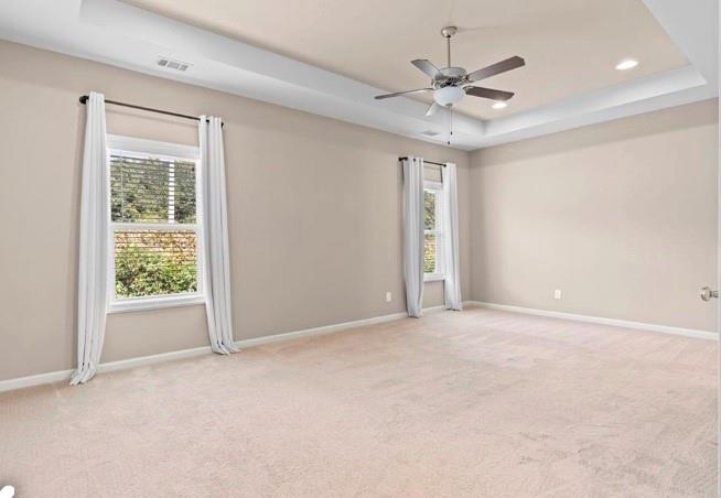1063 Johnson Grove Atlanta, GA 30318 - Photo 13 of 23 an empty room with a ceiling fan and window